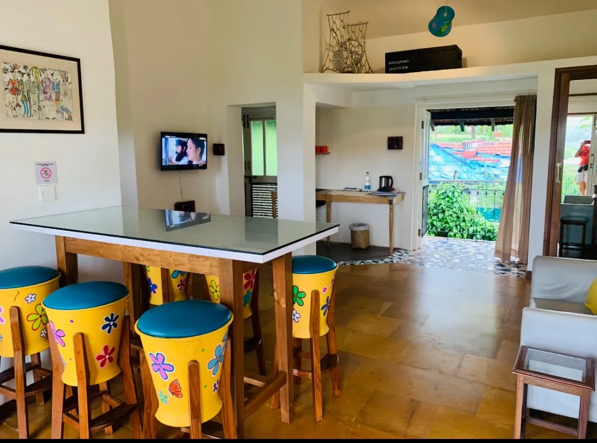 Suite kitchenette and breakfast bar opening to the garden at Cavala